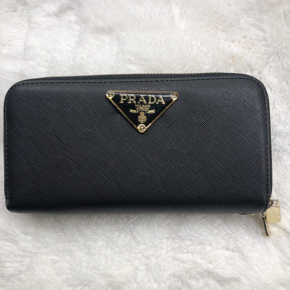 This classic, zippered, black wallet is EVERYTHING